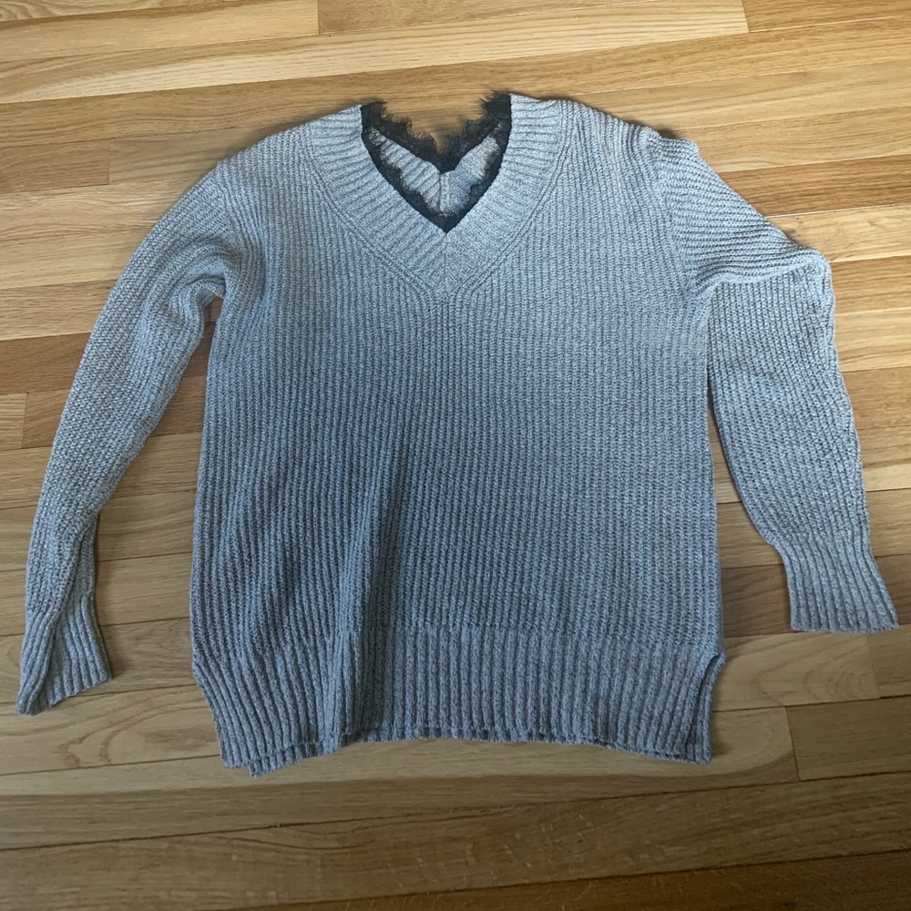 Grey sweater with black lace neck line
